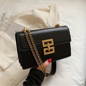 Elegant Black Bag with Gold Chain